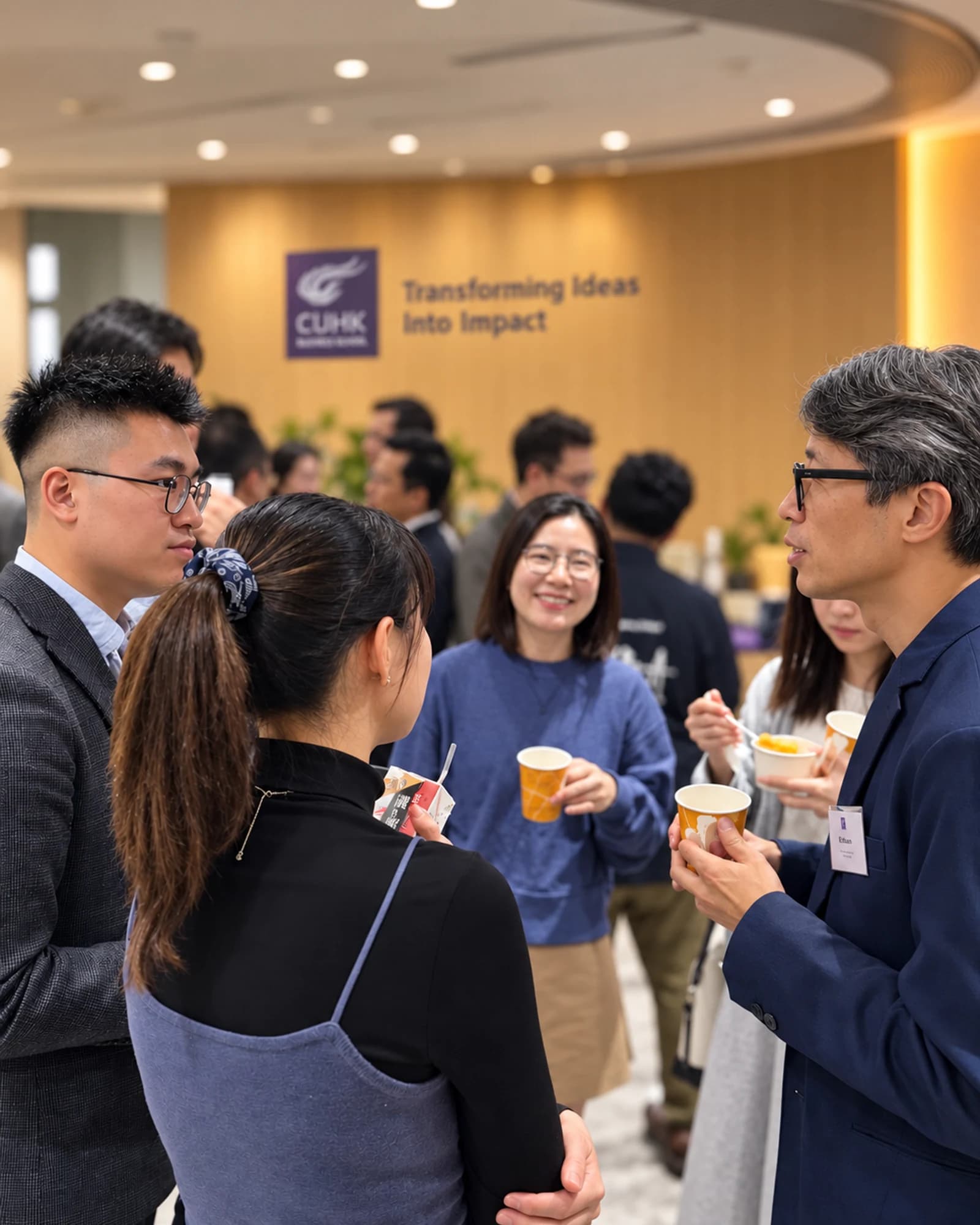 Students and guests in conversation at an IEC gathering from the 2025–26 retrospective
